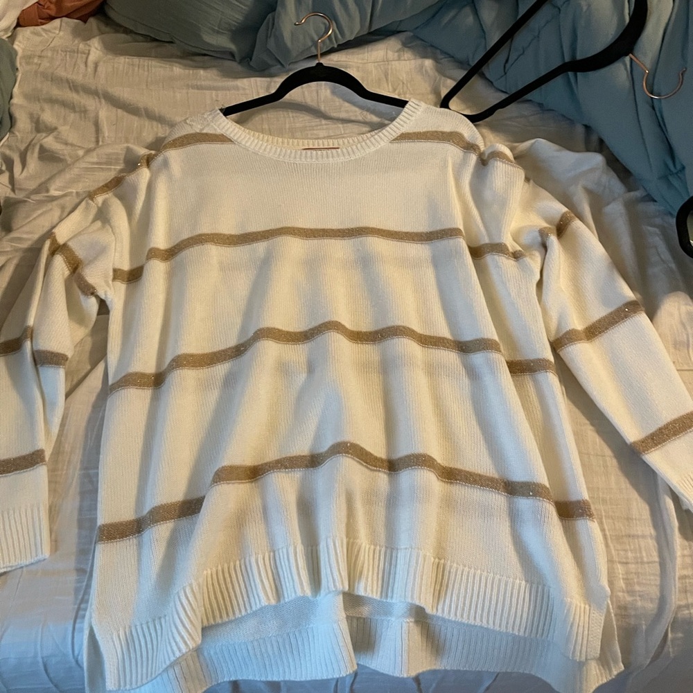 White and gold striped sweater